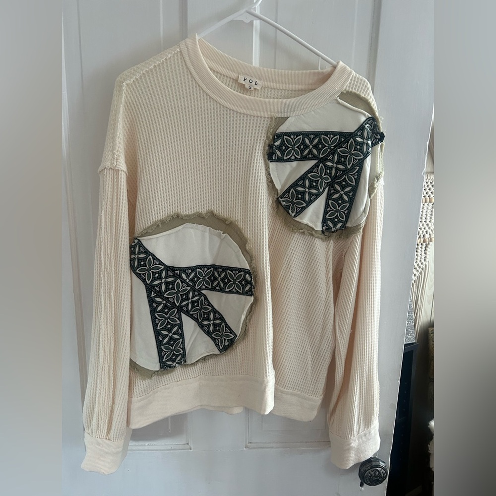 POL Cream Textured Sweatshirt with Black, blue, and green  Accents